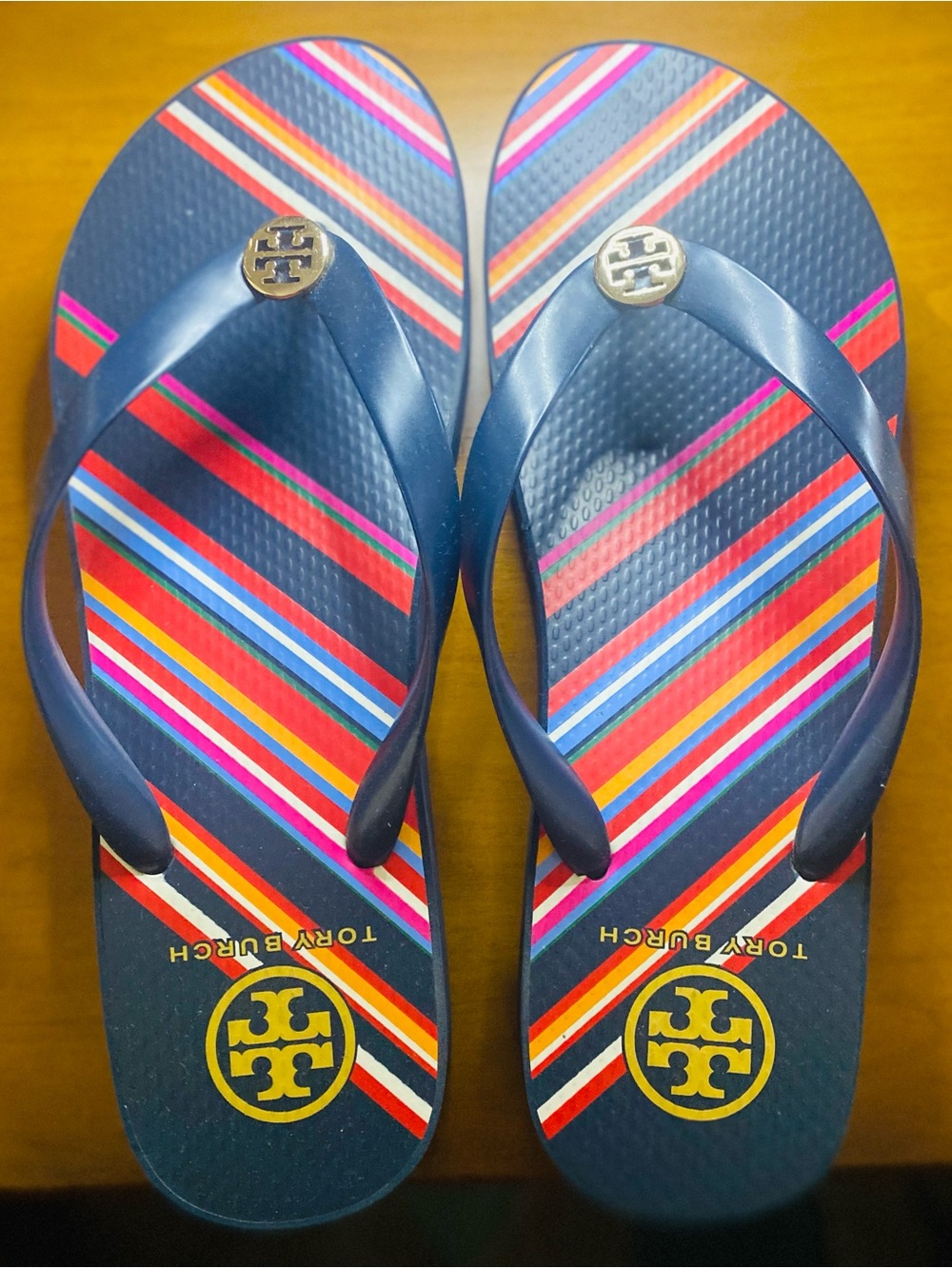 Tory Burch Navy Flip Flops with Multicolor Diagonal Stripes